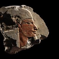 An Egyptian Limestone Relief Fragment with a Nile God