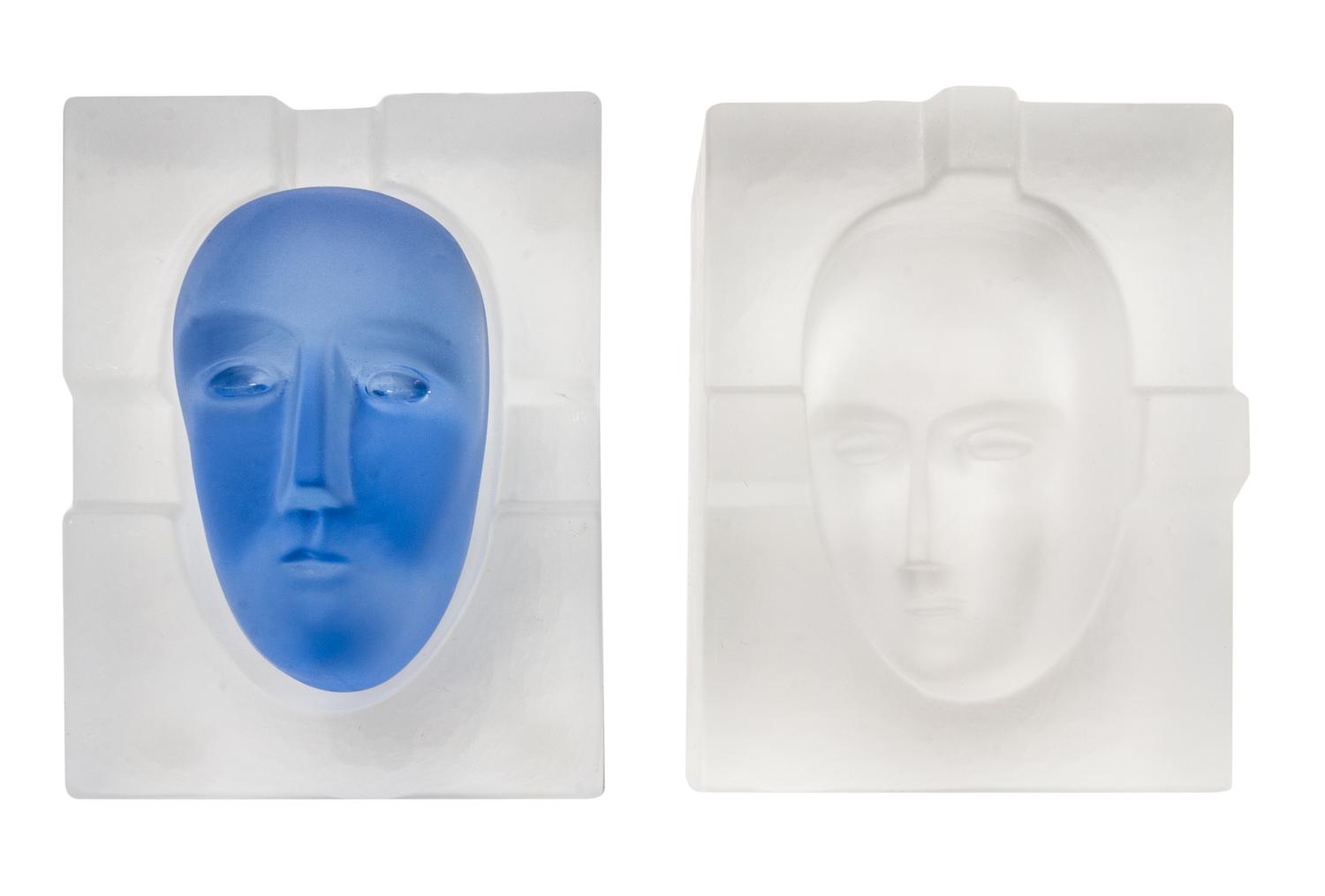 A Kosta Boda Glass Three-Piece Sculpture Width 4 1/4 inches.