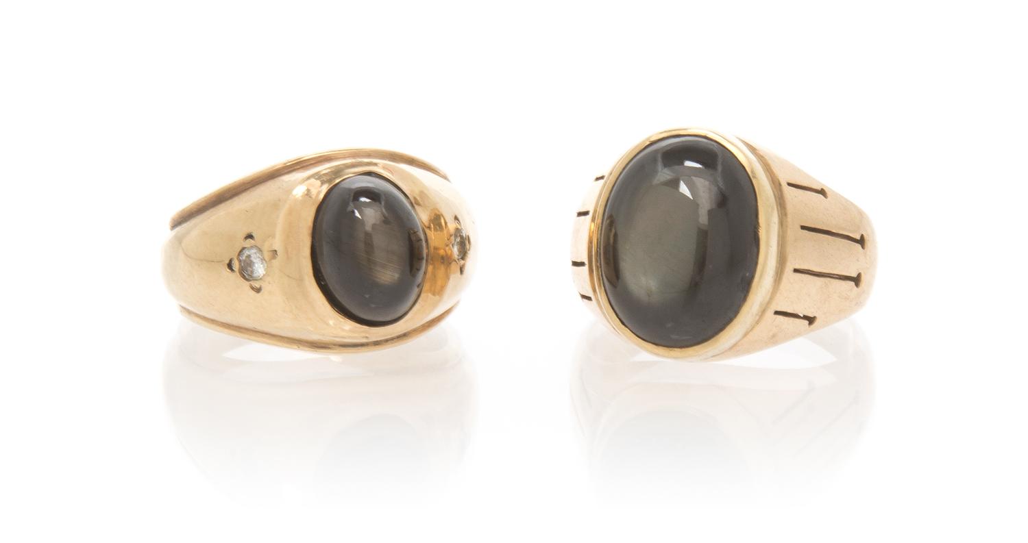 A Collection of Yellow Gold, Black Star Sapphire and Diamond Rings, 12.50 dwts.