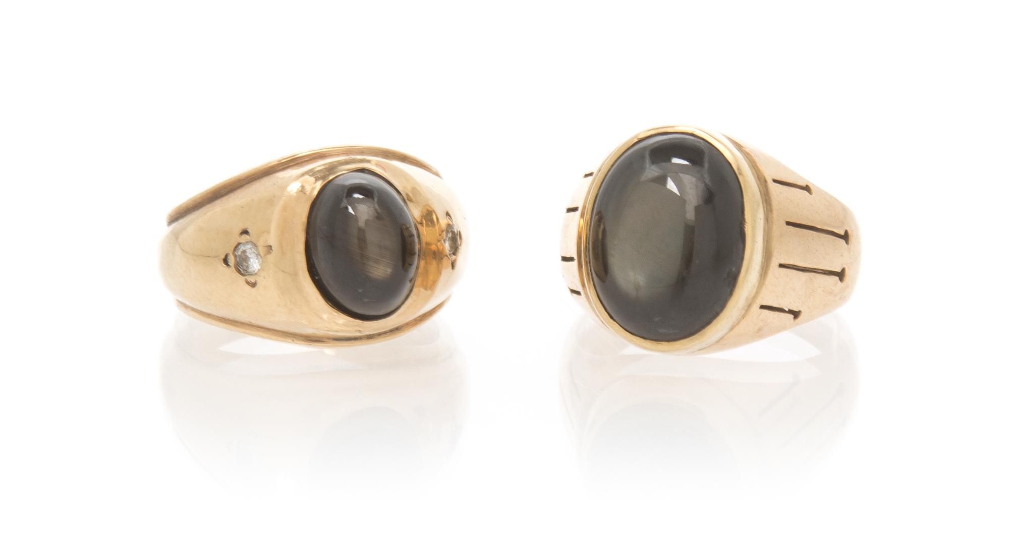 A Collection of Yellow Gold, Black Star Sapphire and Diamond Rings, 12.50 dwts.