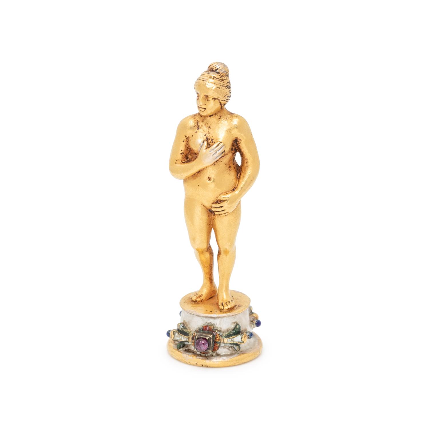 SCULPTURAL FIGURINE