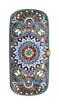 A Russian Enameled Silver Cigarette Case, 19th/20th Century, of rectangular form centered with a polychrome medallion.