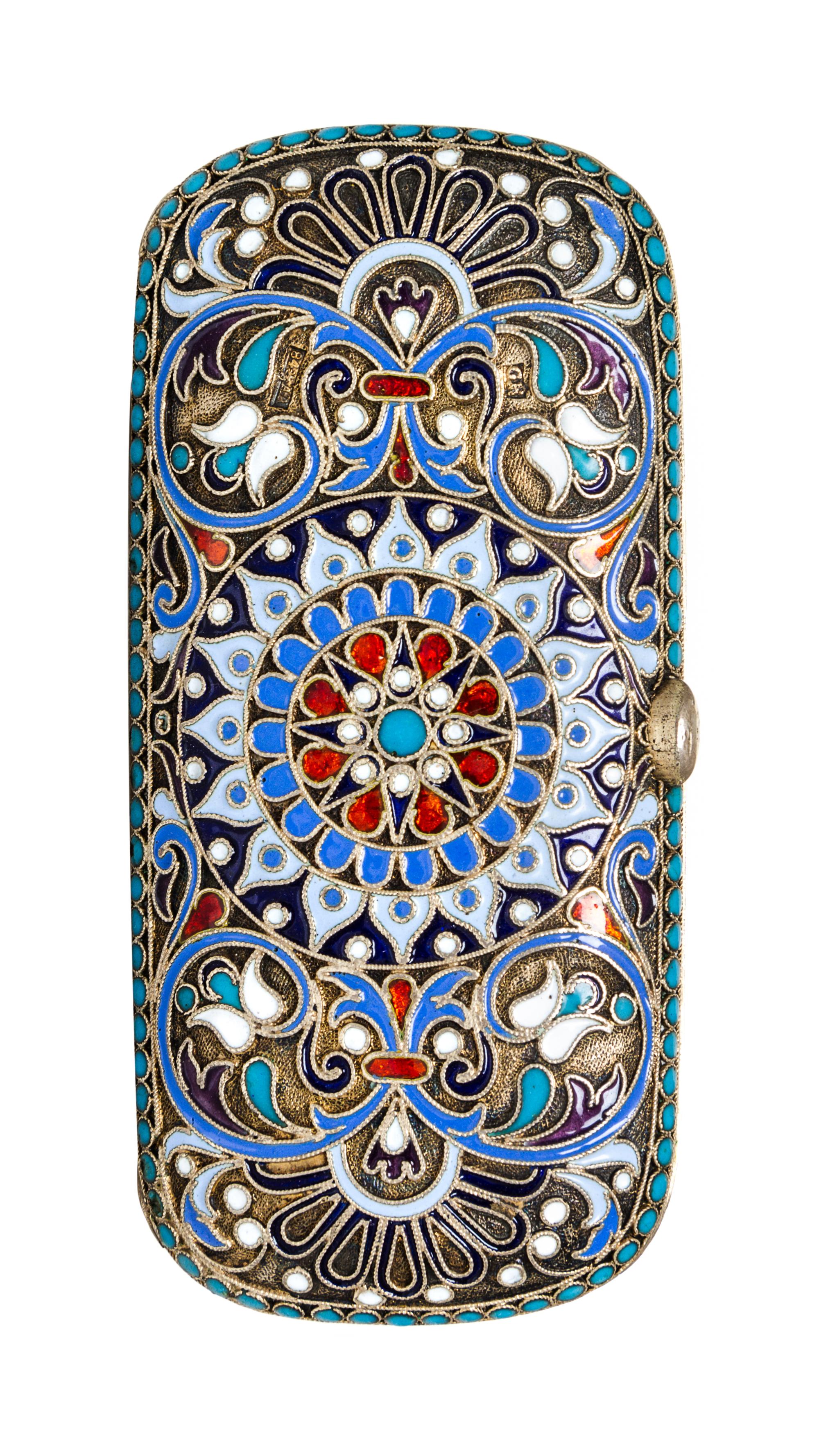 A Russian Enameled Silver Cigarette Case, 19th/20th Century, of rectangular form centered with a polychrome medallion.