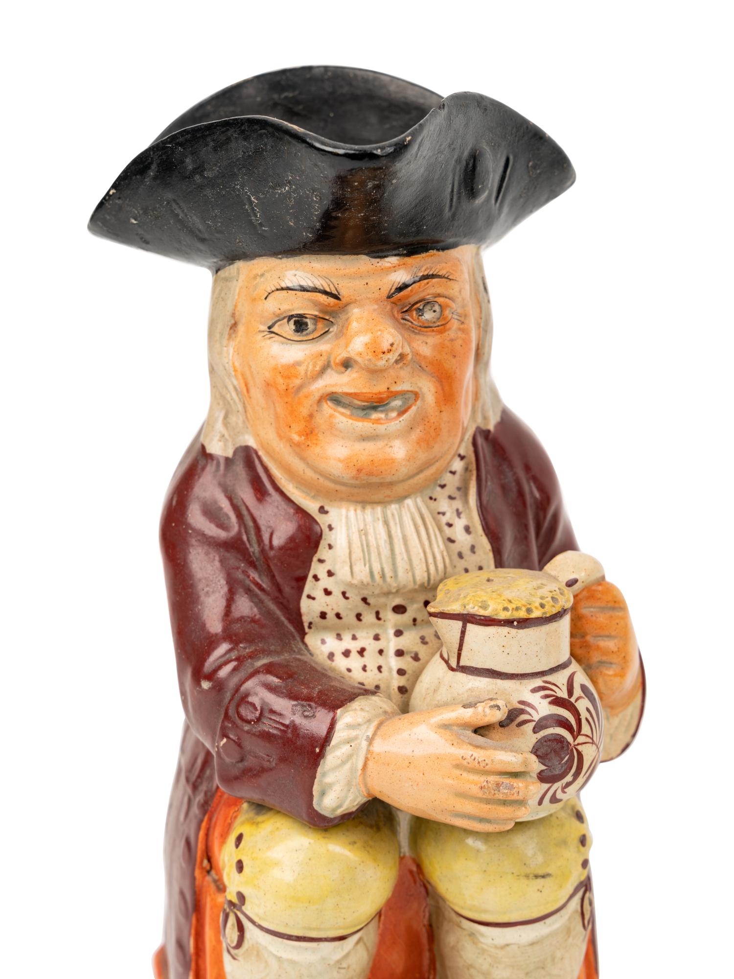 A "Nightwatchman" Toby Jug and Another Toby Jug