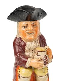 A "Nightwatchman" Toby Jug and Another Toby Jug