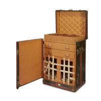 A Goyard fitted wardrobe trunk in black 'Goyardine' printed canvas first quarter 20th century