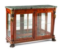 An Empire Egyptian Revival Style Gilt and Patinated Bronze Mounted Mahogany Cabinet