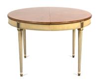 A Louis XVI Style Painted Oval Dining Table Height 29 1/2 x diameter 44 inches. Each leaf 20 inches. — BAKER, 20TH CENTURY