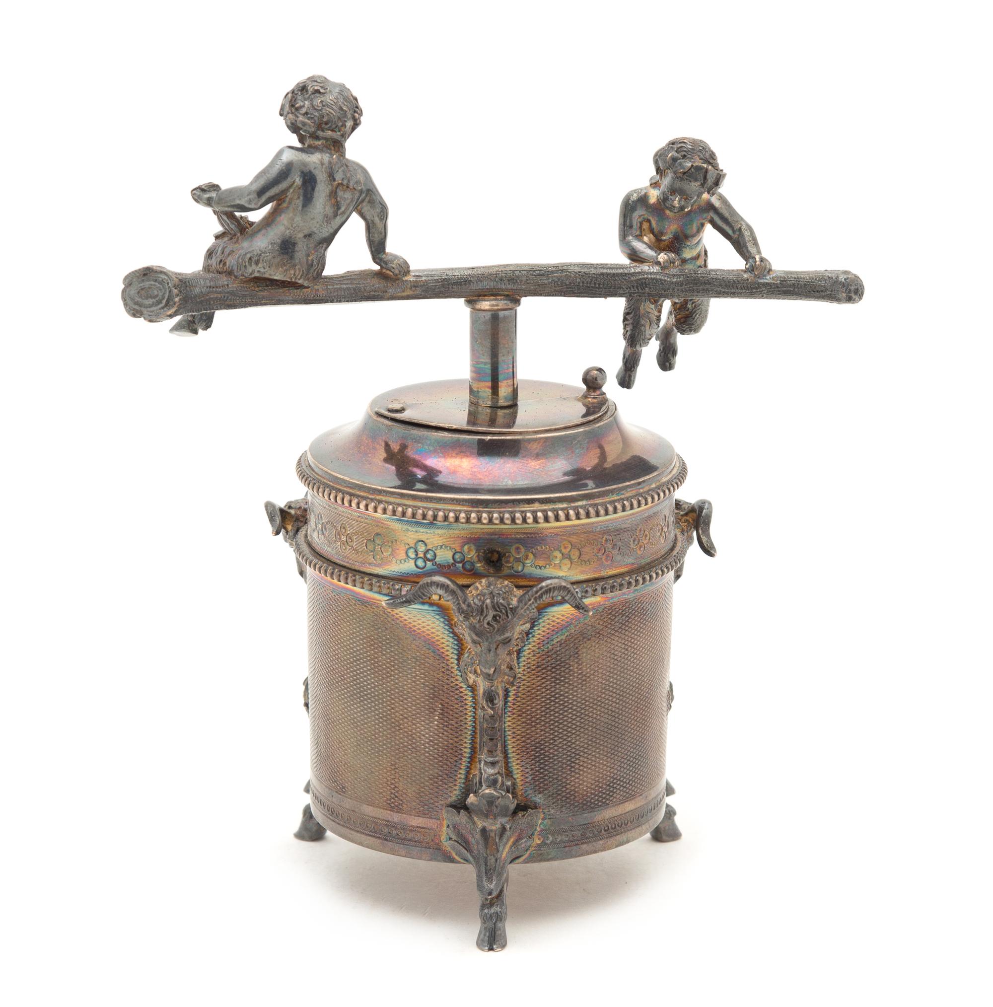 A Silver-Plate Pepper Grinder Height 4 3/4 inches.