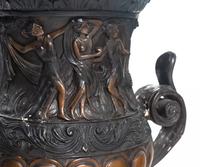 A Pair of Neoclassical Style Cast Metal Urns