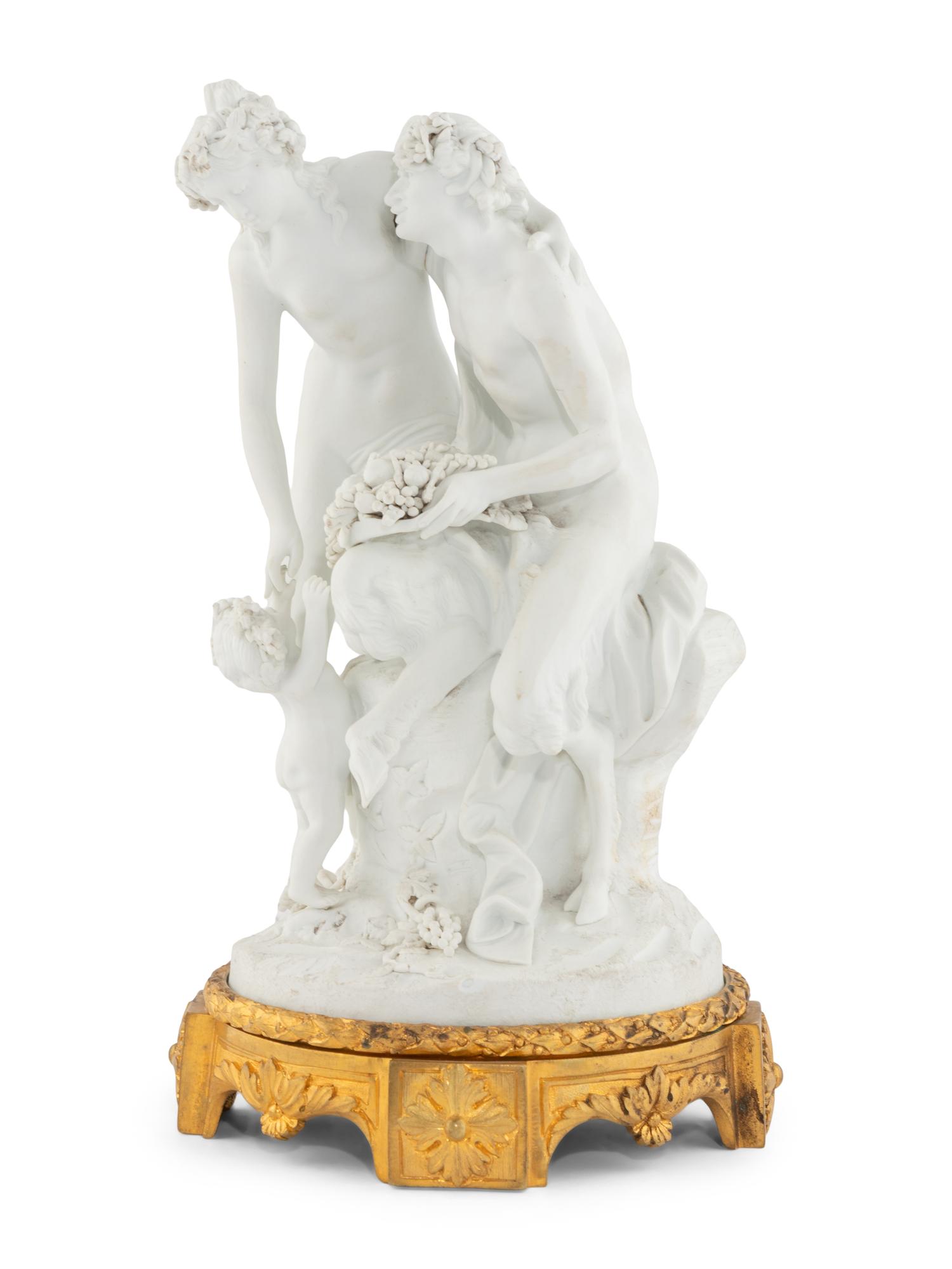 A French Gilt Bronze Mounted Biscuit Porcelain Group