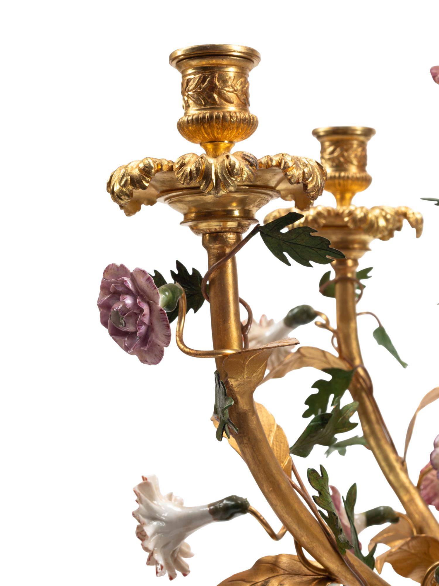 A Pair of Large Continental Gilt Bronze and Porcelain Five-Light Candelabra