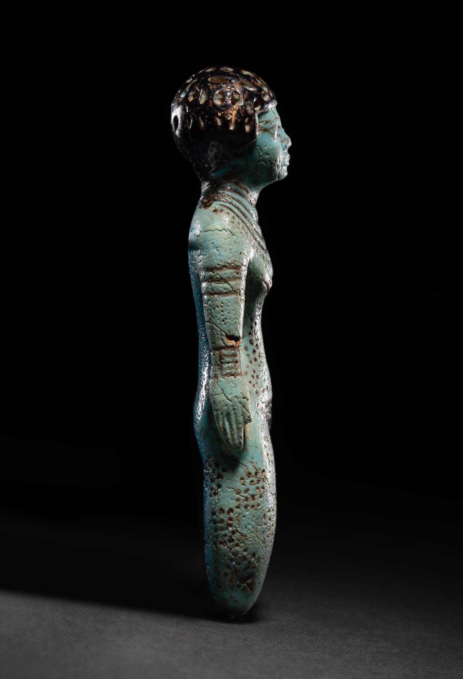 An Egyptian Faience Female Figure