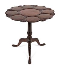 A George III Style Carved Mahogany Tilt-Top Supper Table