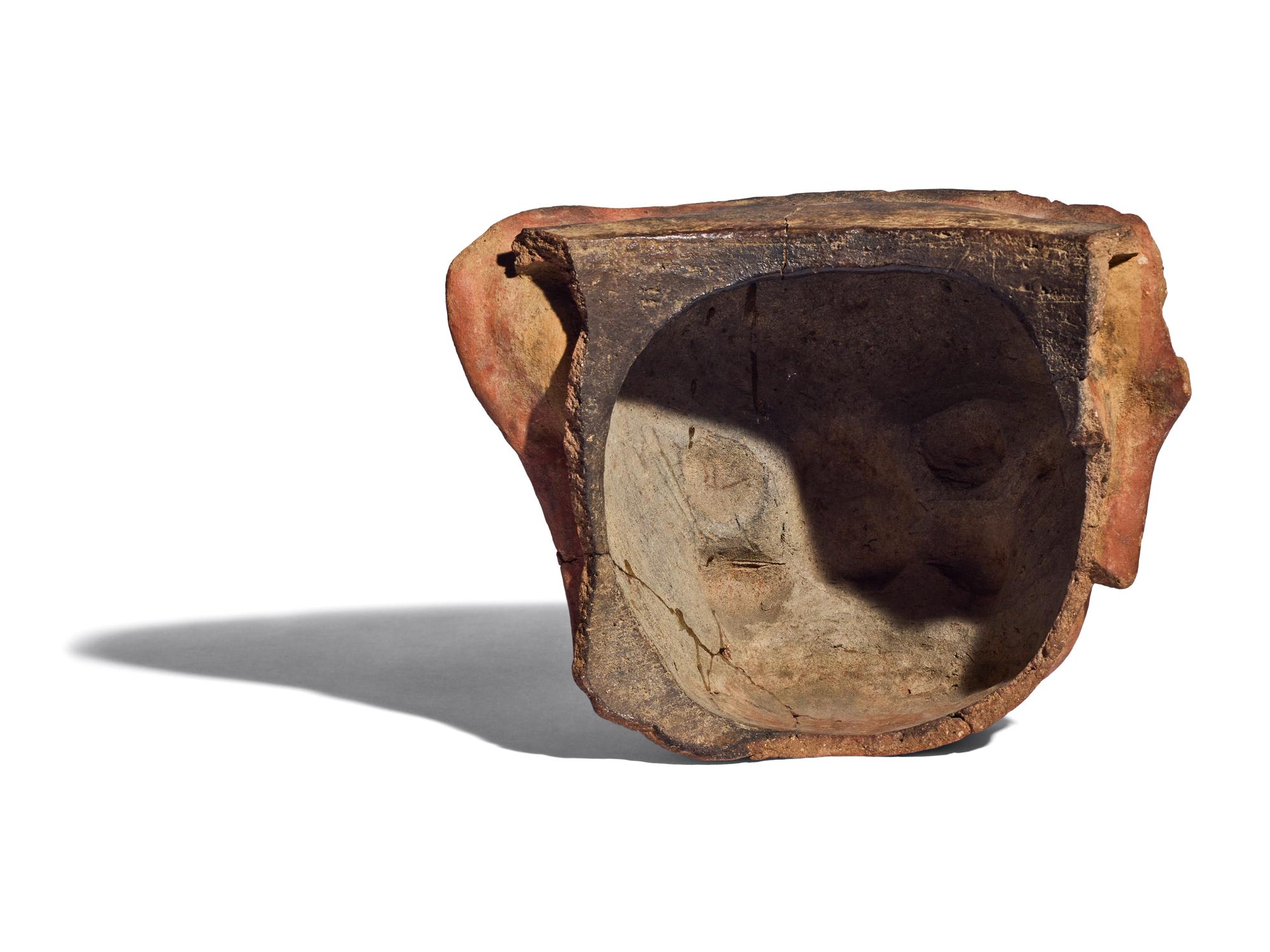 A Maya Red-Ware Incensario Fragment with the Head of a Jaguar