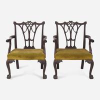 A pair of George III-style Chinoiserie carved mahogany armchairs England, 19th century