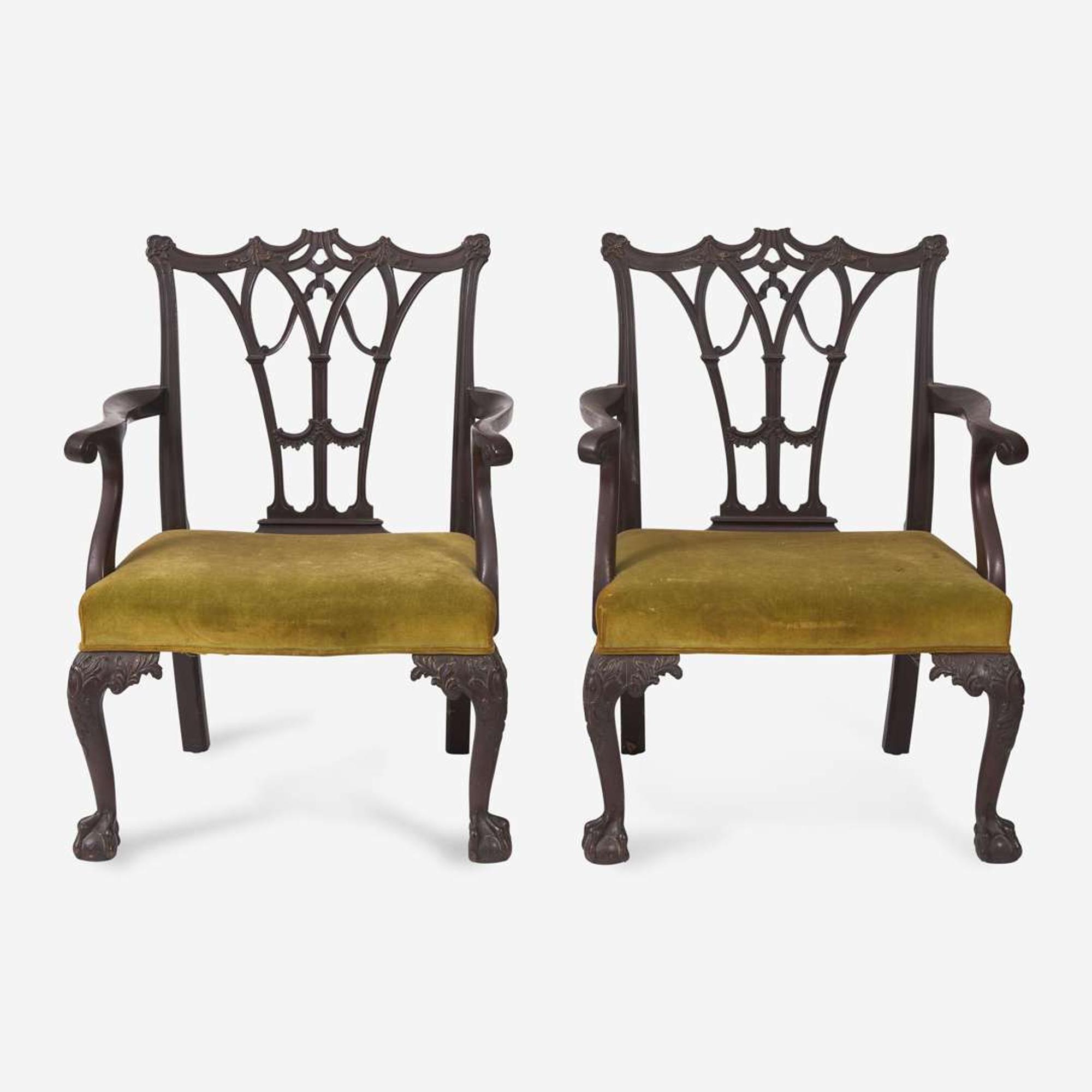 A pair of George III-style Chinoiserie carved mahogany armchairs England, 19th century