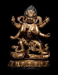 A Large Sino-Tibetan Gilt and Red Lacquered Wood Figure of a Mahākāla