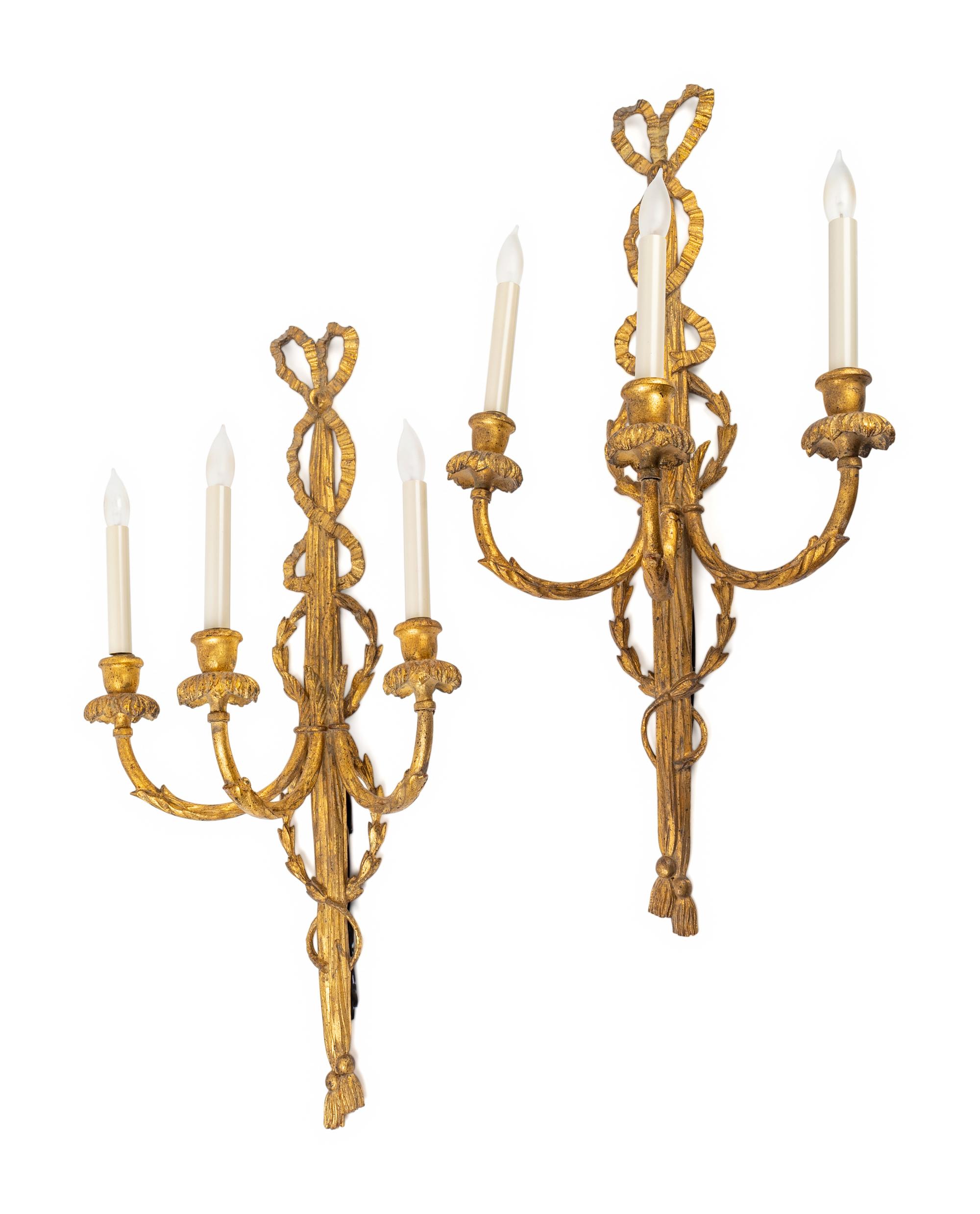 A Pair of Louis XVI Style Giltwood Three-Light Sconces — EARLY 20TH CENTURY