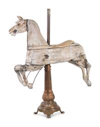 A Carved Pine Horse Form Carousel Figure