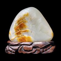 A Chinese Russet and Pale Celadon Jade Boulder