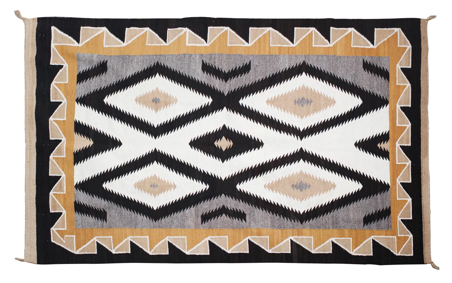 A Navajo Rug 76 x 49 inches. — MID-20TH CENTURY