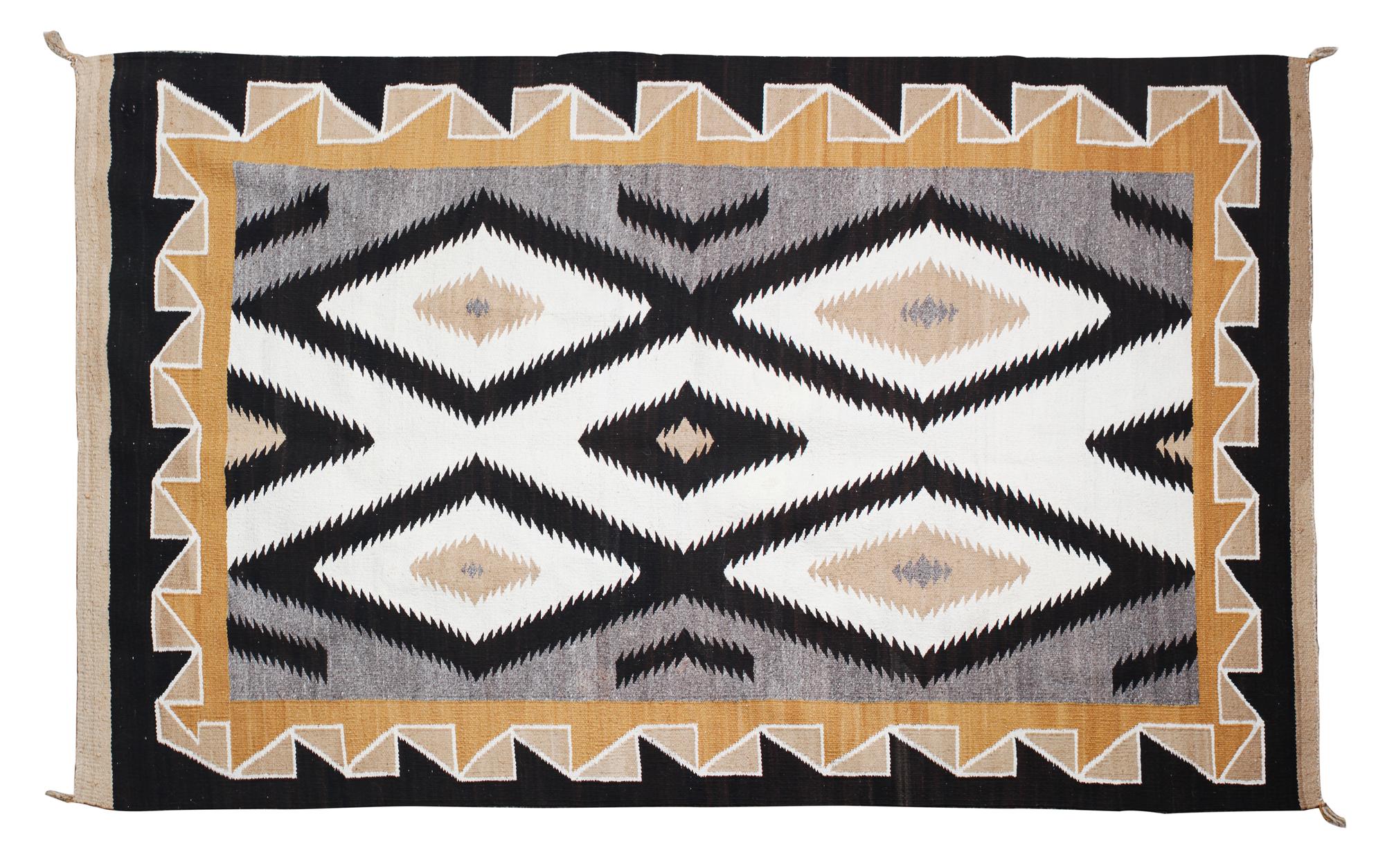 A Navajo Rug 76 x 49 inches. — MID-20TH CENTURY