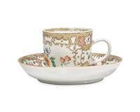 A Chinese Export Porcelain Famille Rose Chocolate Cup And Saucer