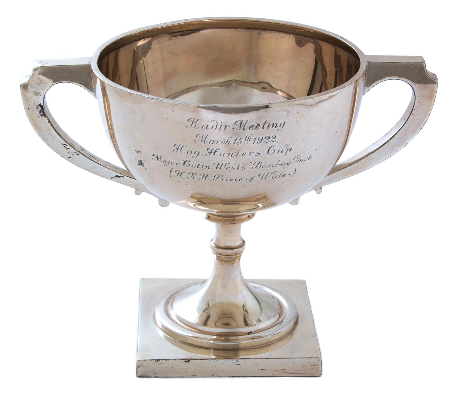 An Indian Silver Race Cup, Circa 1922, on a square pedestal base, the otherwise plain hemispherical bowl engraved with an inscription b