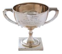 An Indian Silver Race Cup, Circa 1922, on a square pedestal base, the otherwise plain hemispherical bowl engraved with an inscription b