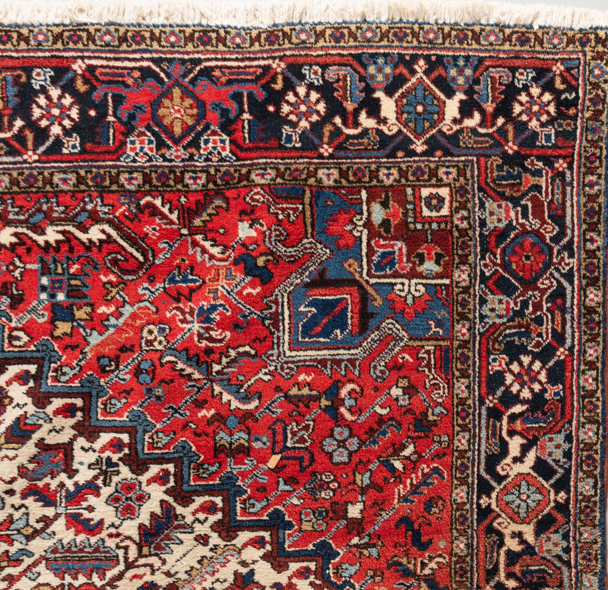 A Heriz Wool Rug