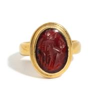 A Roman Carnelian Ring Stone with the Goddess Minerva — Set in a gold ring