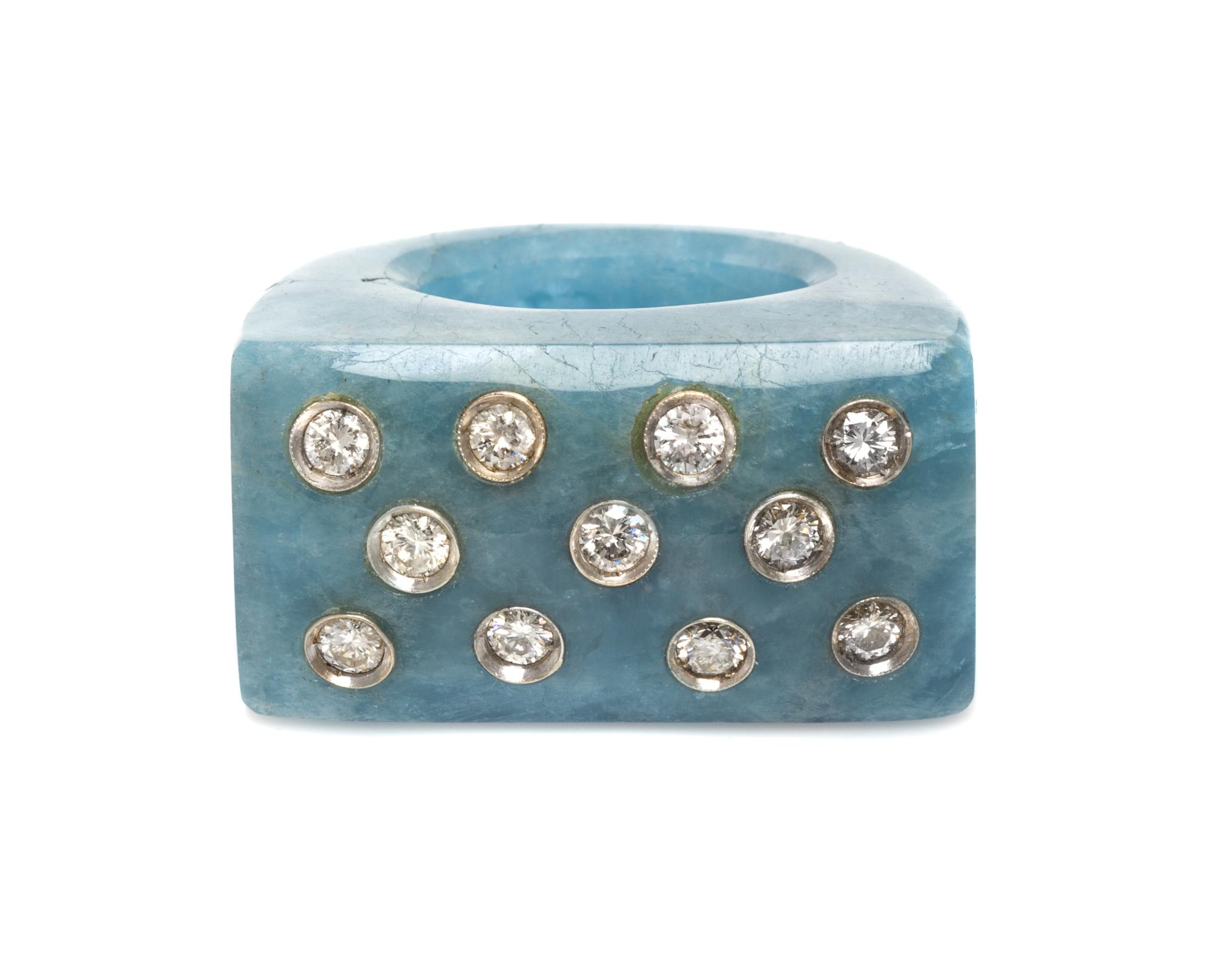 A White Gold, Carved Aquamarine and Diamond Ring, 18.70 dwts.