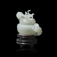 A Small Chinese Carved White Jade ' Qilong' Covered Jar 白玉螭龍蓋罐