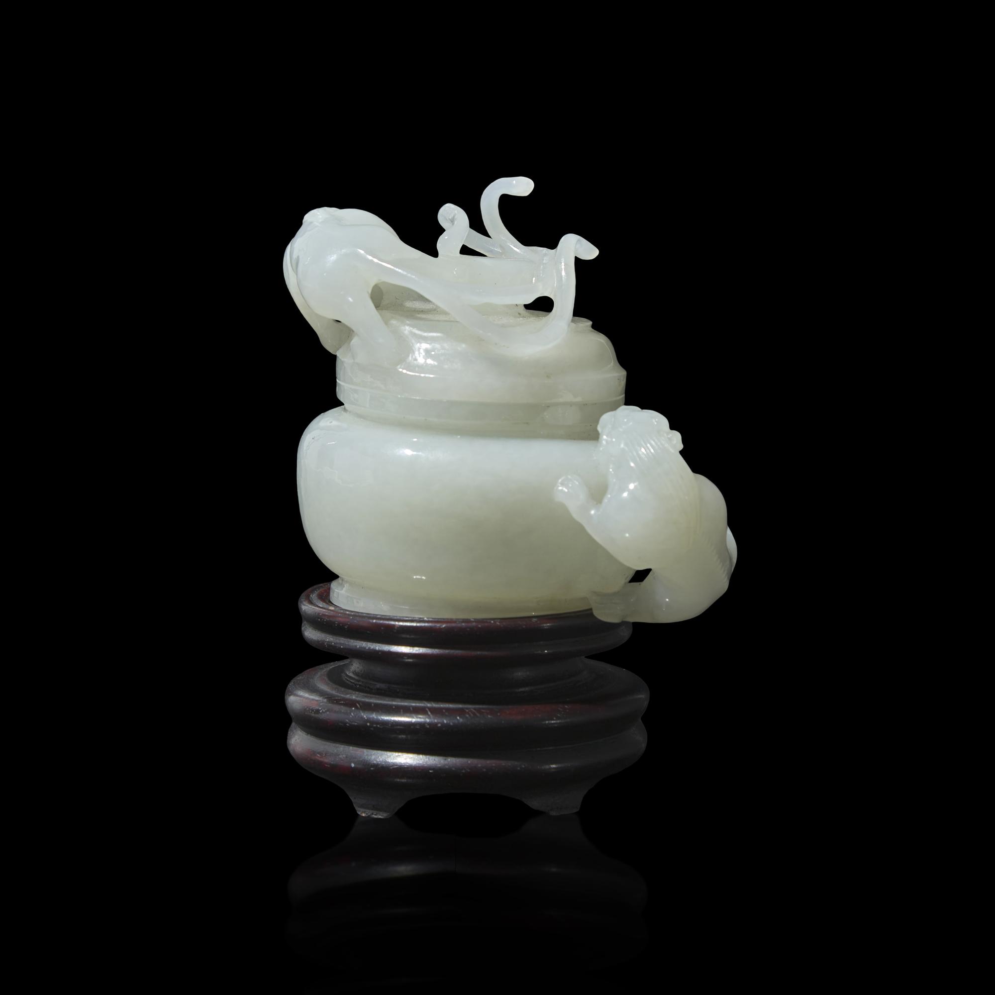 A Small Chinese Carved White Jade ' Qilong' Covered Jar 白玉螭龍蓋罐