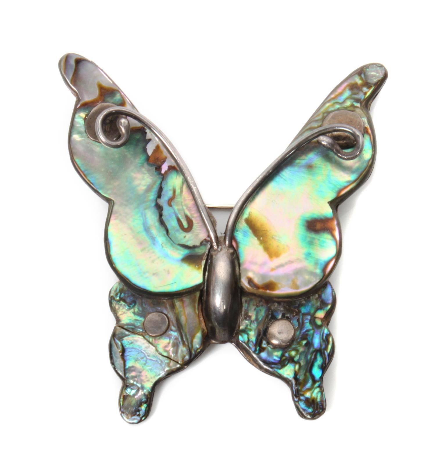 A Mexican Silver and Mother of Pearl Butterfly Pin Length of necklace 19 1/2 inches.