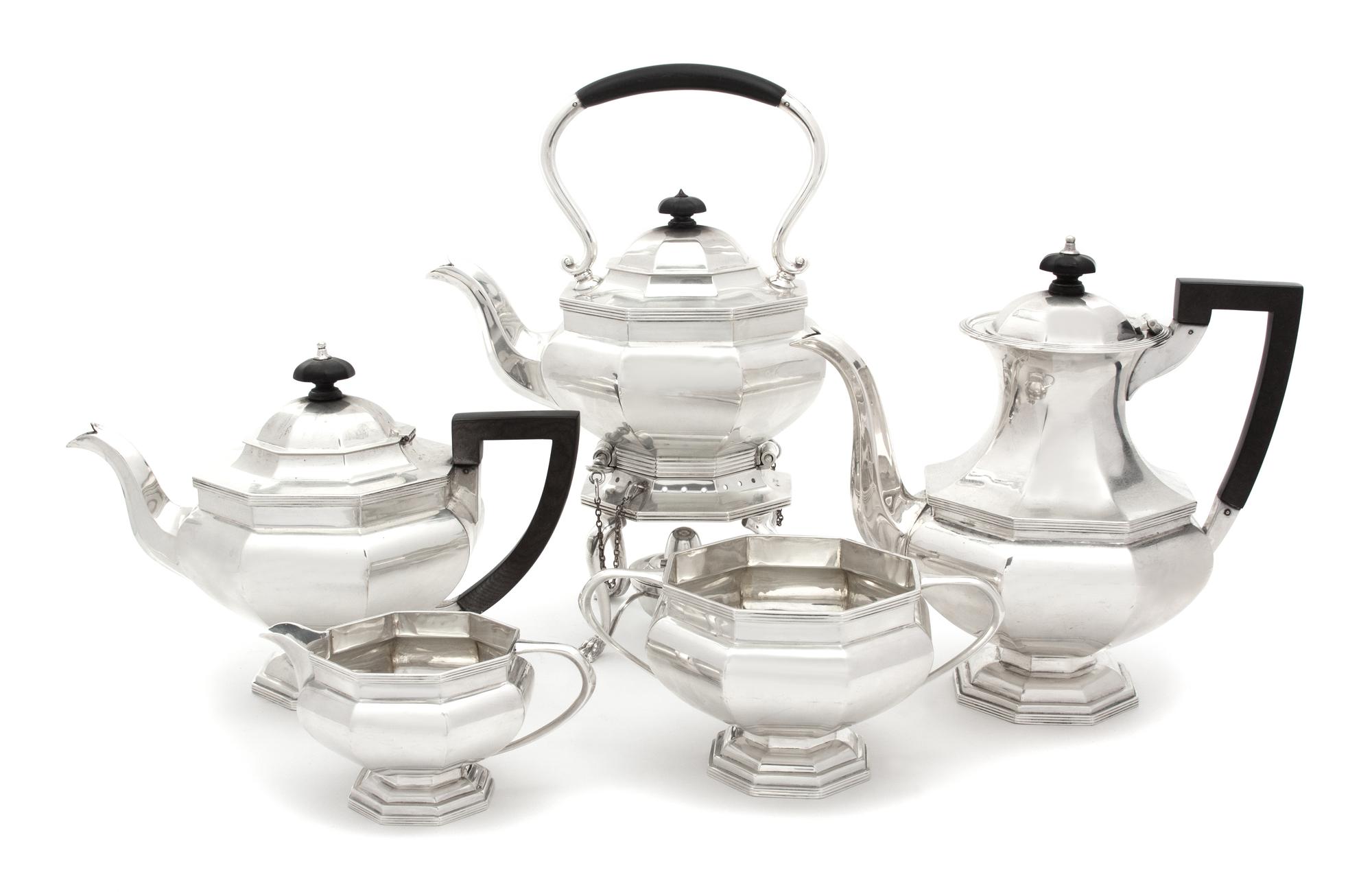 A Five-Piece English Silver Tea and Coffee Service, Martin, Hall & Company, Sheffield, 1909, comprising a teapot, coffee pot, hot water