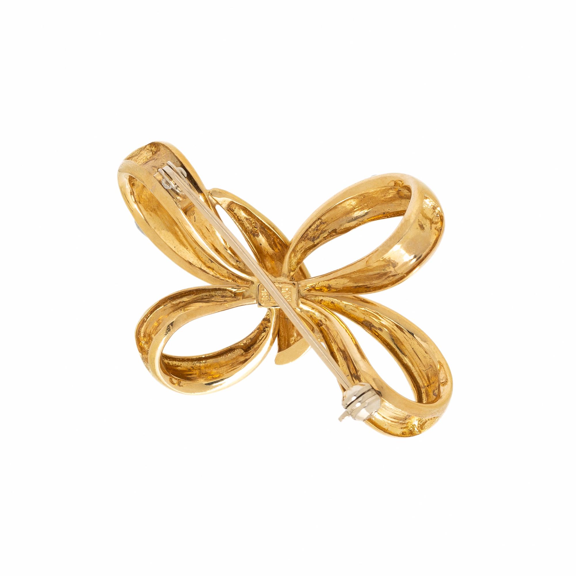 NEIMAN MARCUS, YELLOW GOLD BOW BROOCH