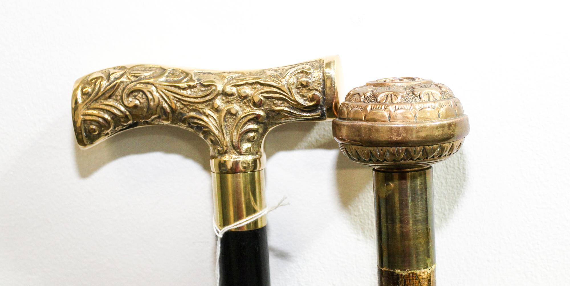 A Group of Two Canes Length of longest 36 5/8 inches.