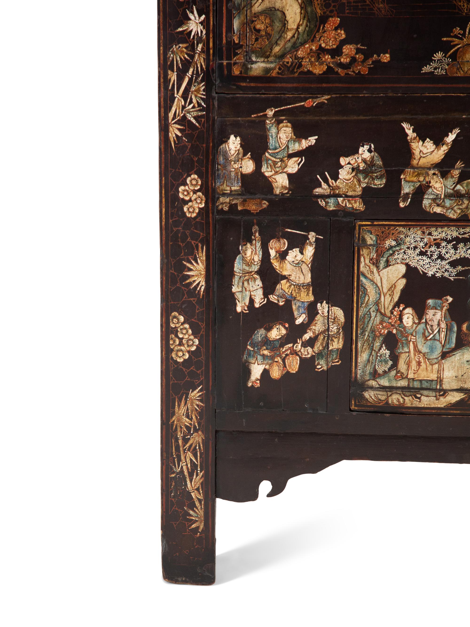 A Chinese Black Lacquer and Polychrome Scholar's Cabinet