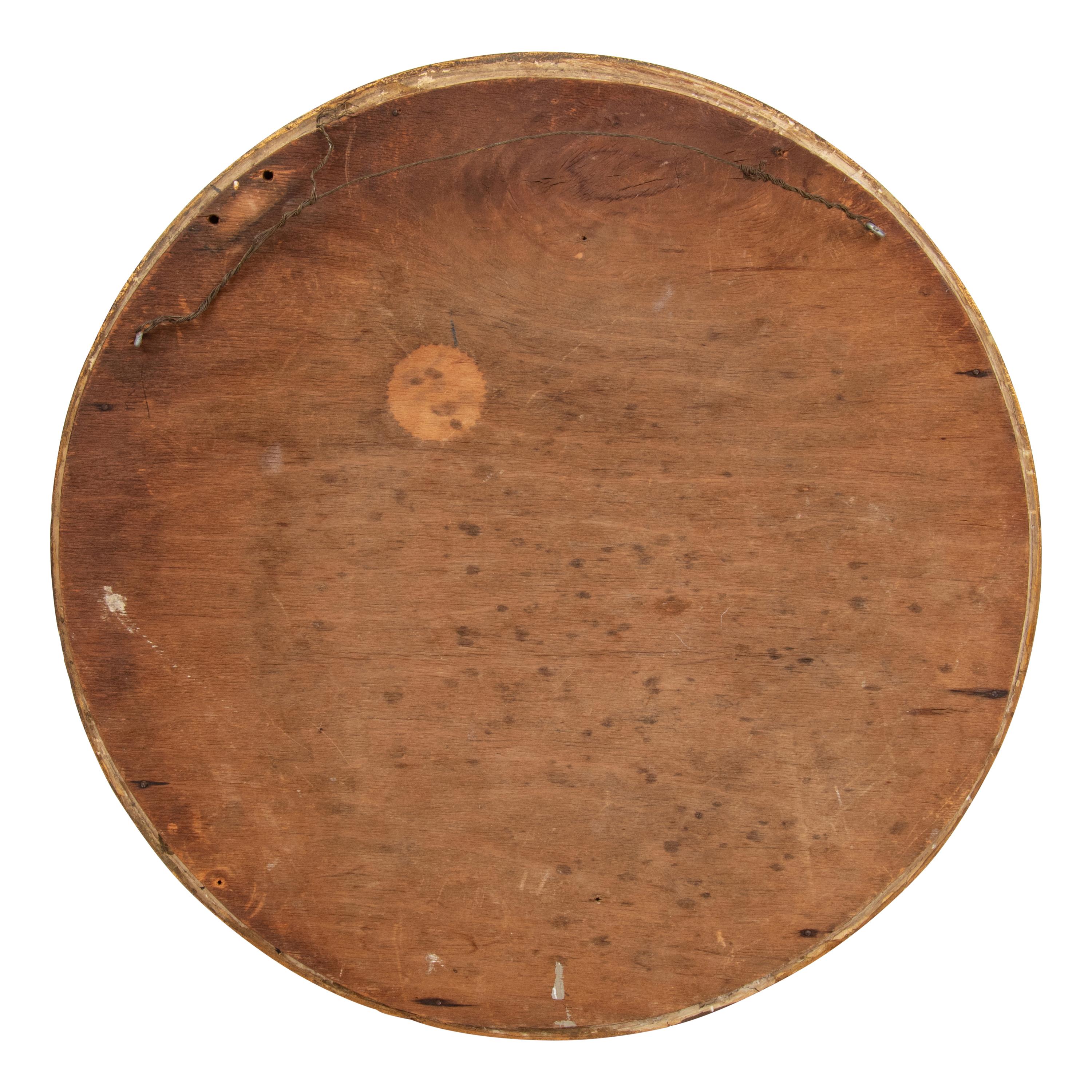 A Regency Giltwood and Part Ebonized Bullseye Mirror