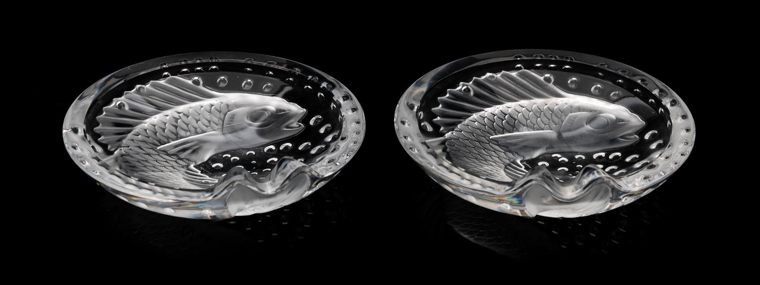 A Pair of Lalique Fish Dishes Diameter 6 1/4 inches.