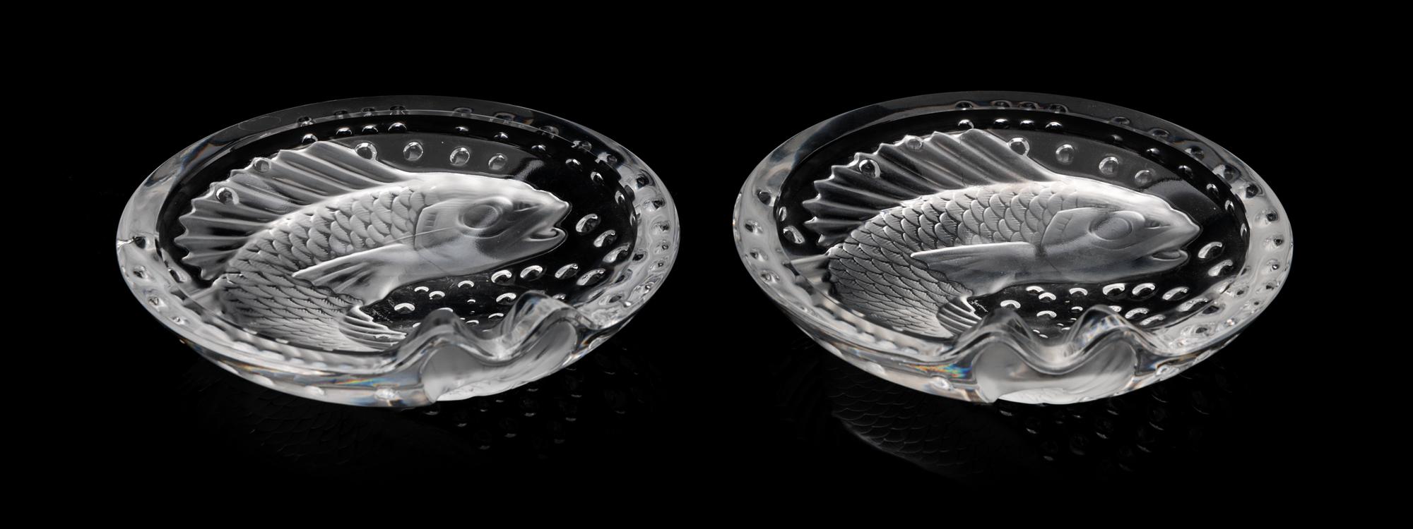 A Pair of Lalique Fish Dishes Diameter 6 1/4 inches.