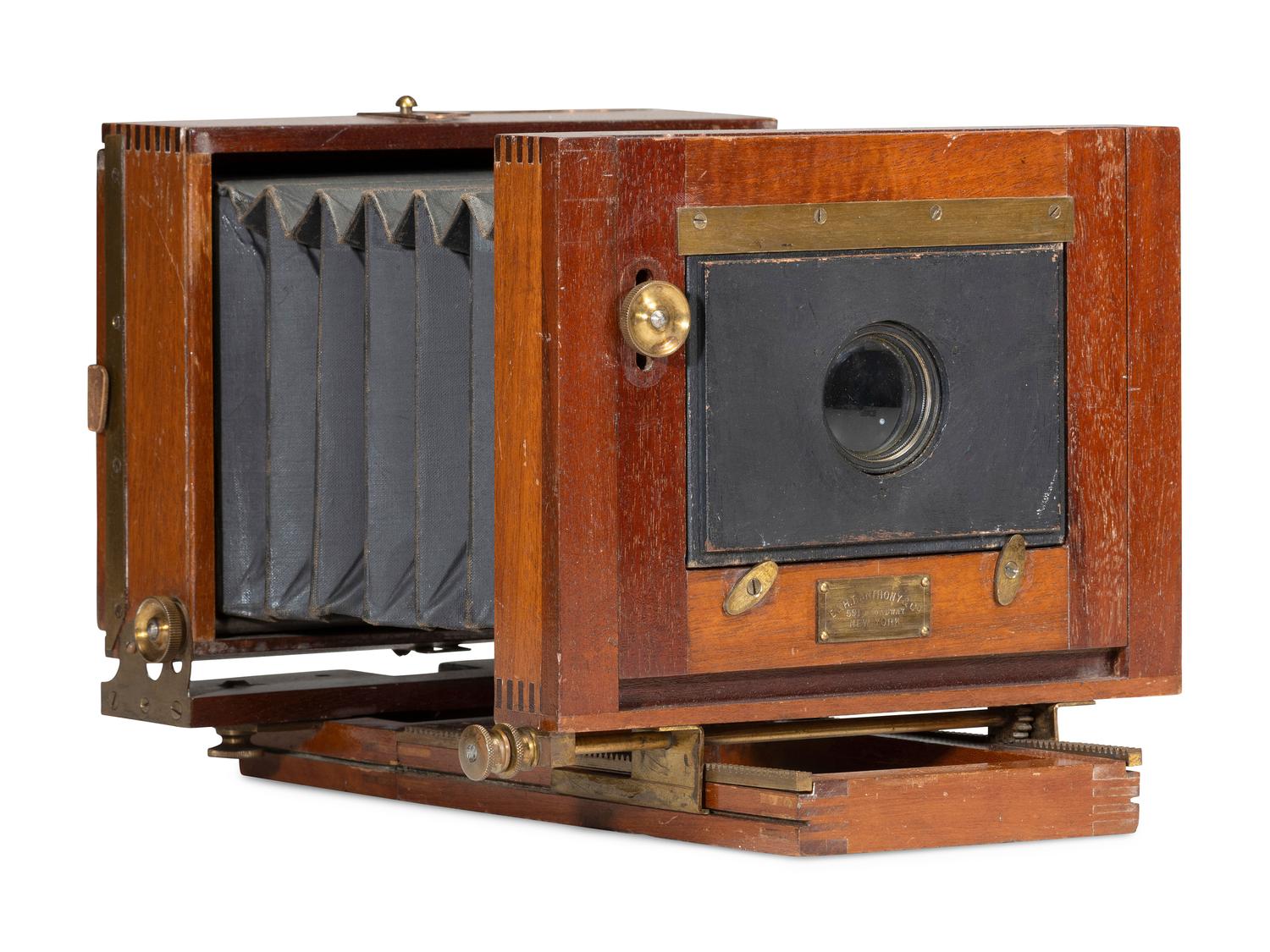 [EARLY PHOTOGRAPHY]. 2 cameras made by E. & H.T. Anthony, including the Victor and Champion. Ca late 1880s.