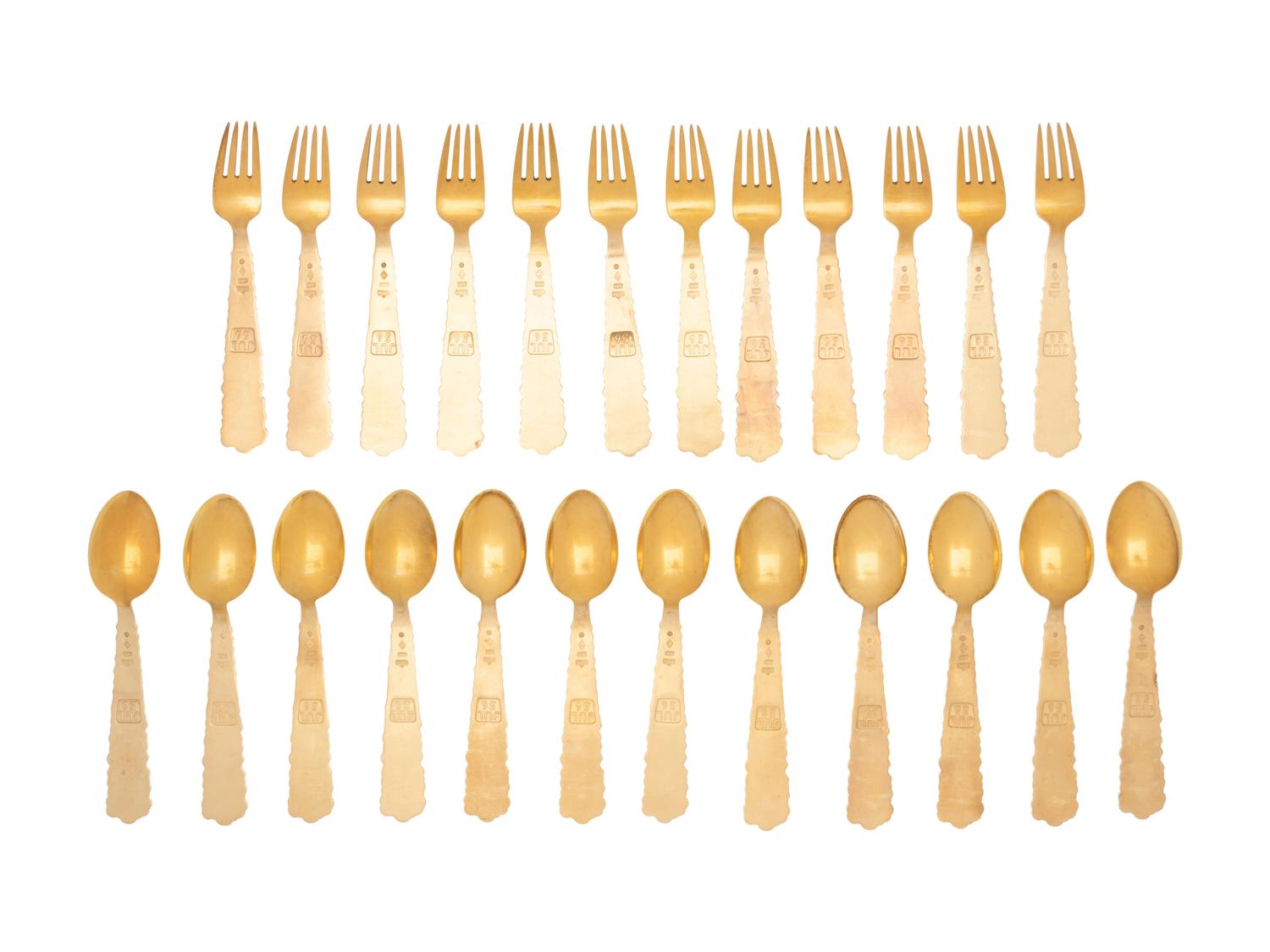 A Set of Danish Enameled Silver-Gilt Flatware Articles