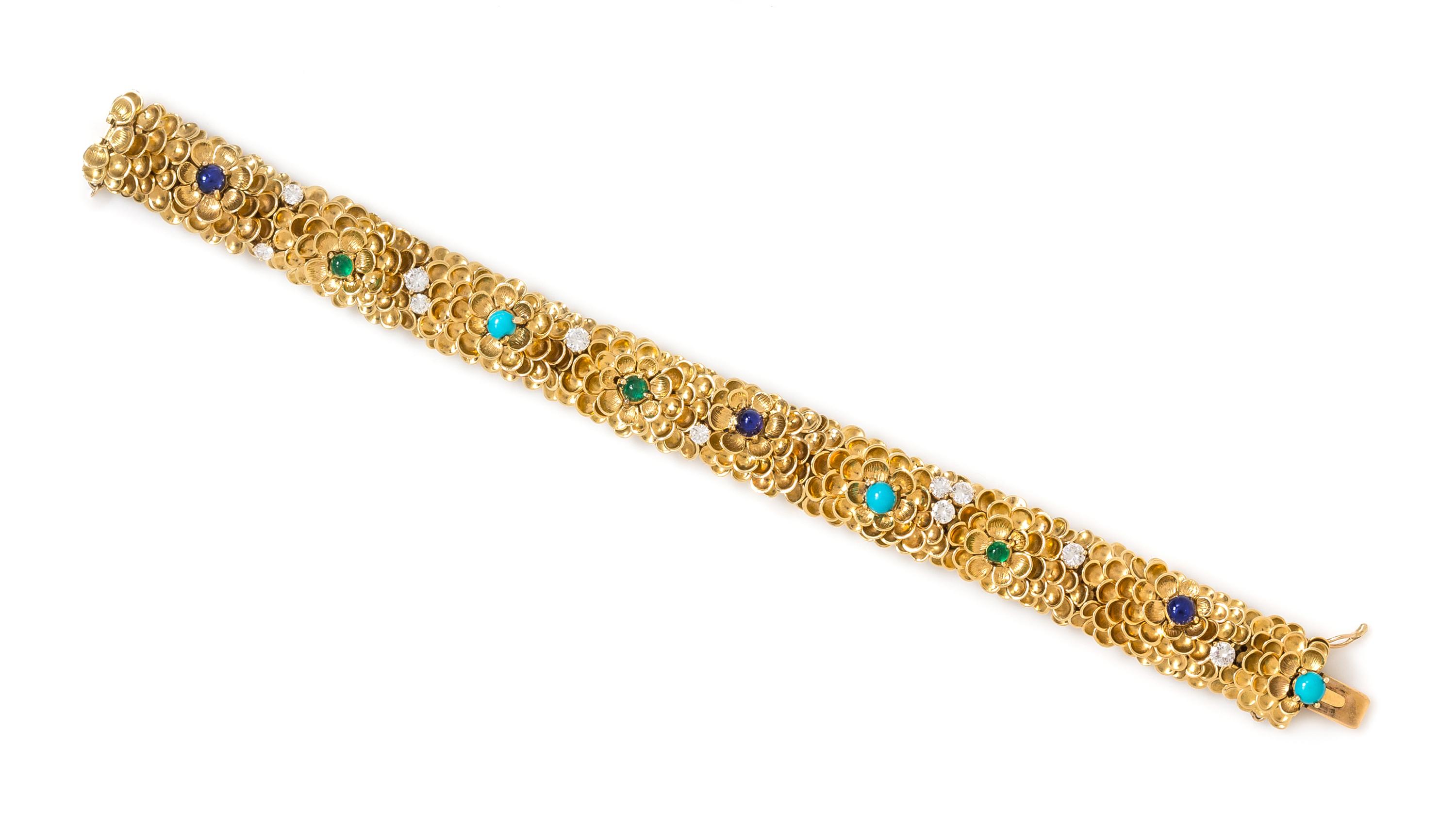 An 18 Karat Yellow Gold, Diamond and Multigem Floral Motif Bracelet, Cartier, 39.30 dwts.