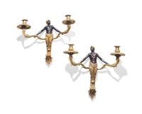 A pair of Louis XVI gilt and patinated bronze figural wall sconces, 18th / 19th century