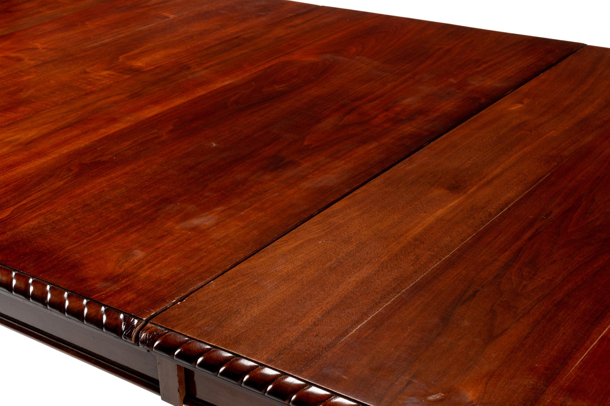 A George III Style Walnut Dining Table