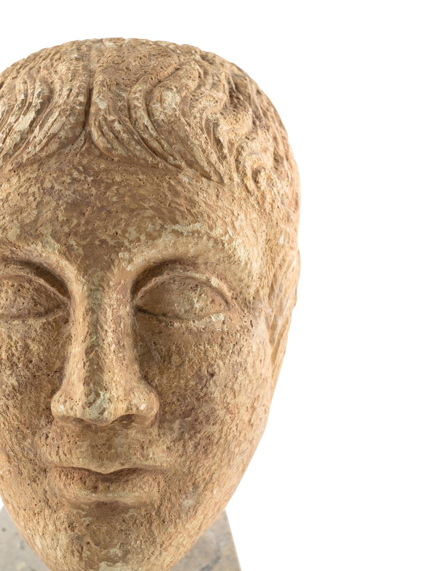 A Roman Stone Head of a Man