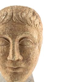 A Roman Stone Head of a Man